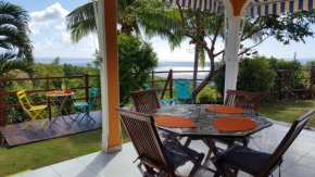 Maison de 2 chambres avec vue sur la mer jardin clos et wifi a Vieux Habitants a 2 km de la plage